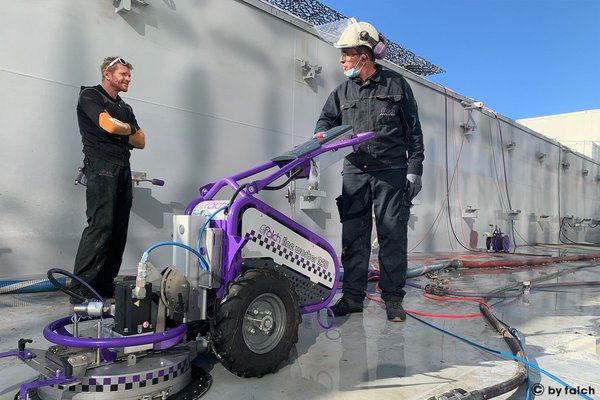 crew using falch automated deck cleaning machine for ship cleaning